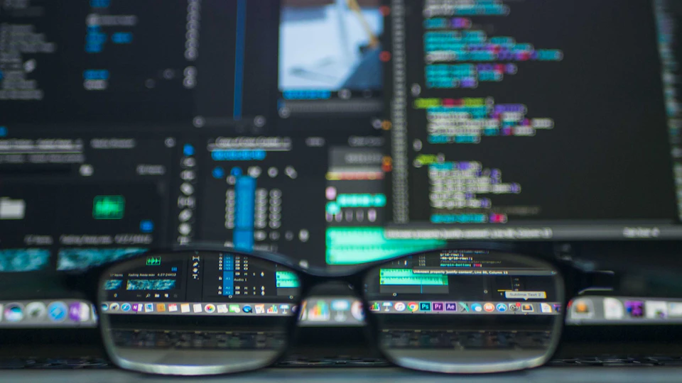 Developer workspace with code on screen for mobile browser play